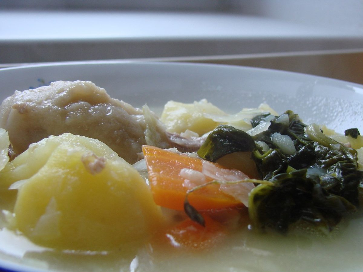 Maori boil-up, a soup made from potatoes, pork bones, dumplings, cabbage and variety of another greens. Pumpkin and sweet potatoes are also added traditionally. [Matyas Havel, CC BY-SA 3.0 https://creativecommons.org/licenses/by-sa/3.0, via Wikimedia Commons]